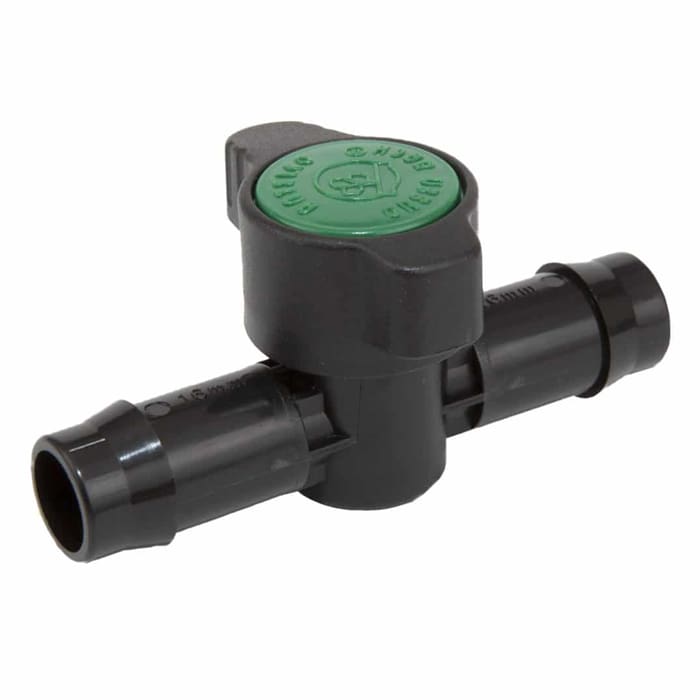 Black plastic valve with green top.