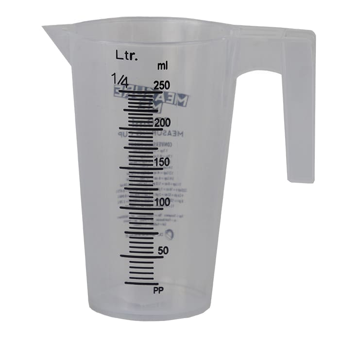 Clear measuring cup with volume markings.