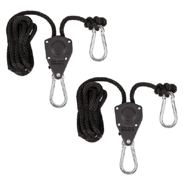 Two pulleys with black ropes and carabiners.