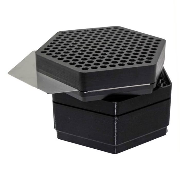 Hexagonal box with a perforated top.