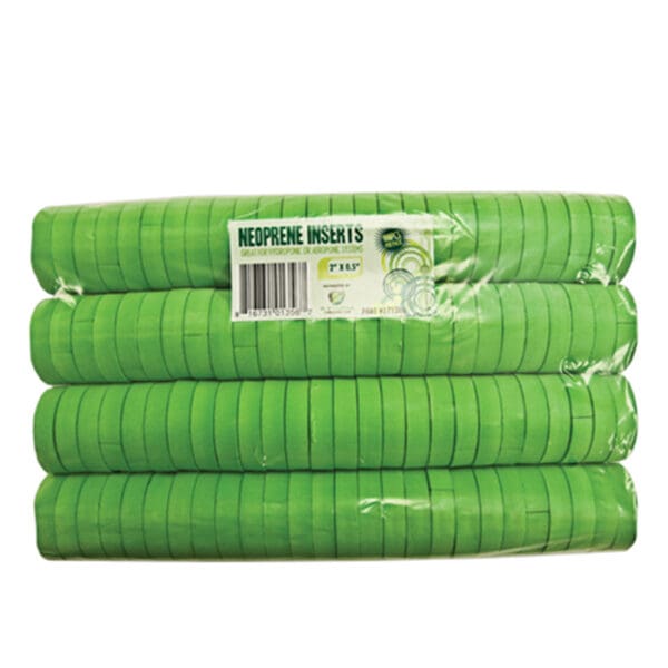 Green neoprene inserts stacked in packaging.