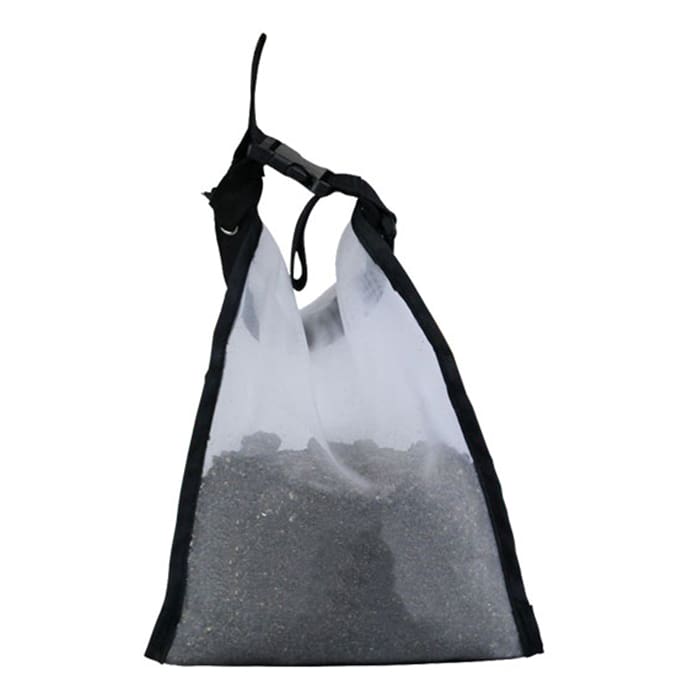 Black and white bag filled with sand.