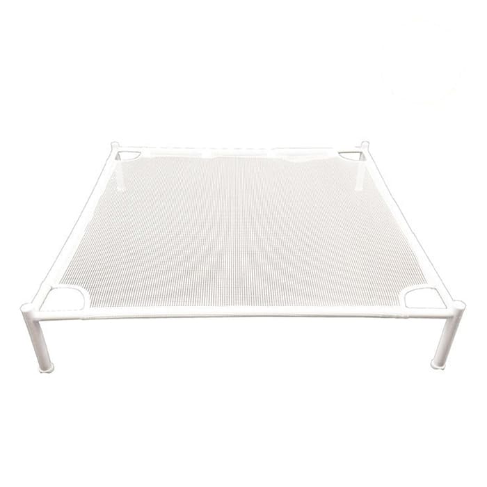 White mesh pet bed on a simple frame.