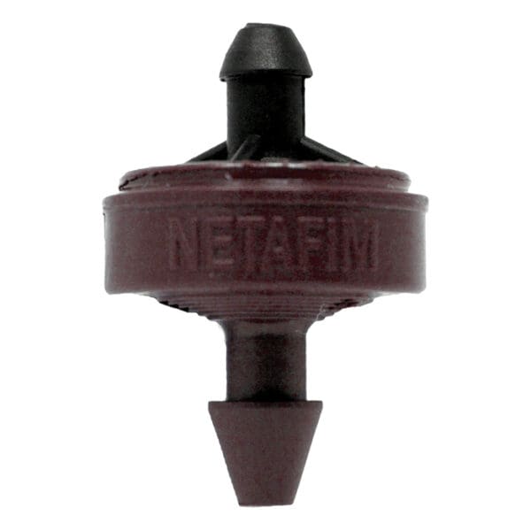 Drip irrigation emitter with NETAFIM branding.