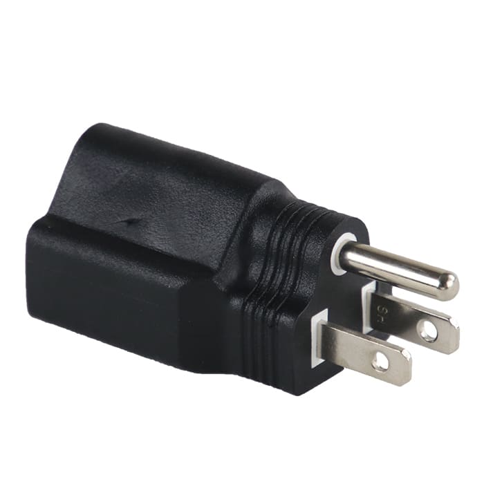 Black electrical plug adapter on white background.