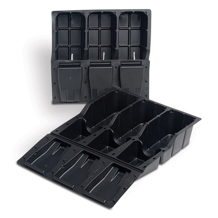 Black plastic trays with multiple compartments.