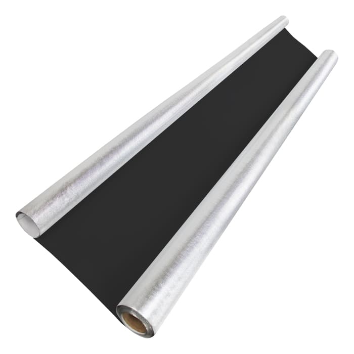 Black wrapping paper rolls on a table.