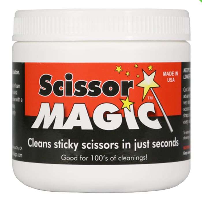 Container of Scissor Magic cleaning product.