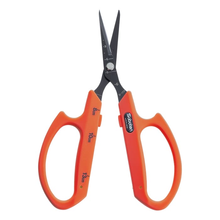 Orange scissors with measuring markings.