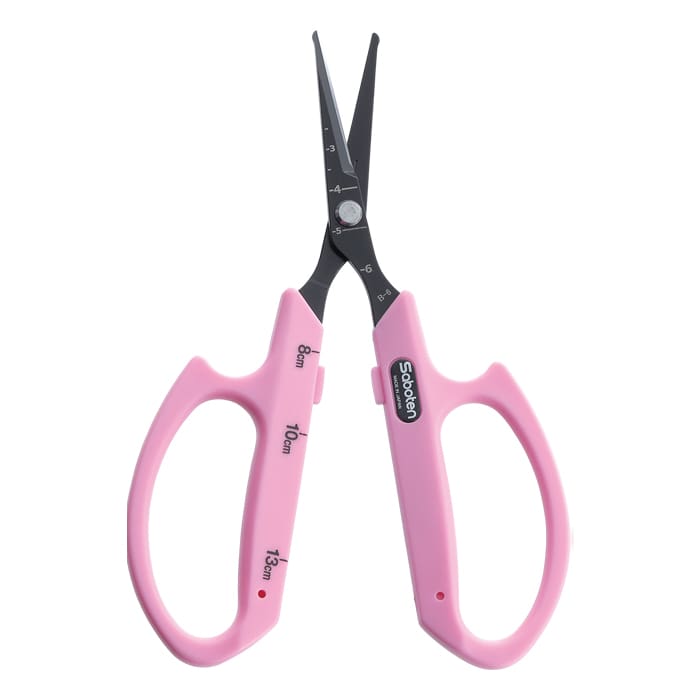 Pink scissors with measurement markings.