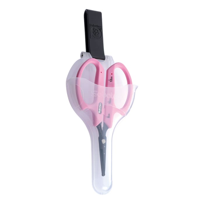 Pink scissors in protective plastic case.