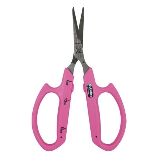 Pink scissors with metal blades and handles.