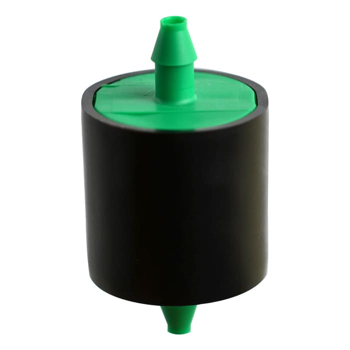 Green and black cylindrical object with spout.