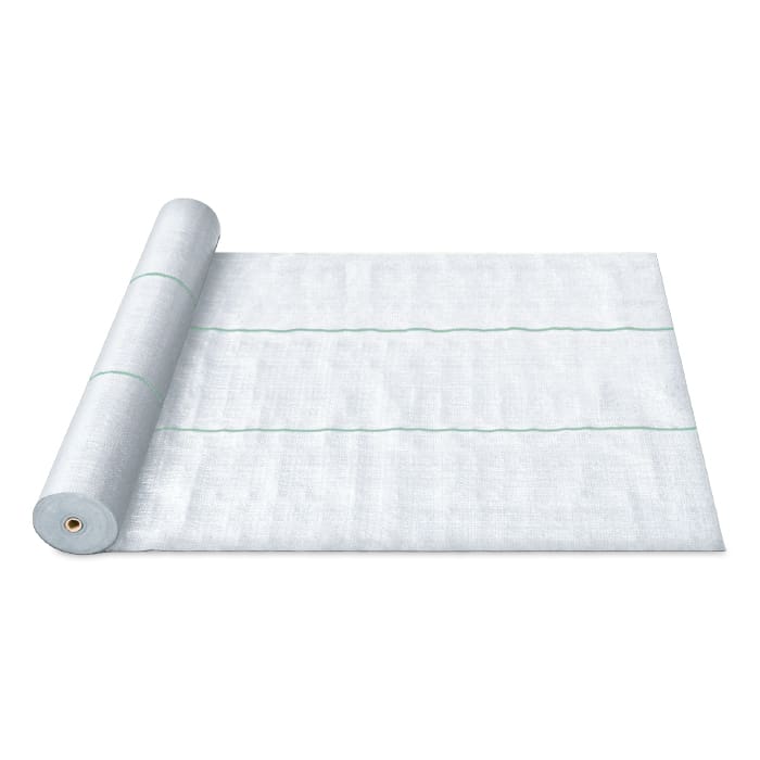 White roll of fabric material on flat surface.