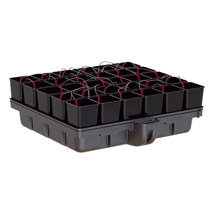 Black planting tray with multiple seed pots.