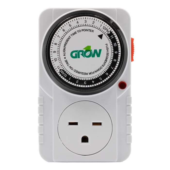 Timer switch with dial and electrical outlet.