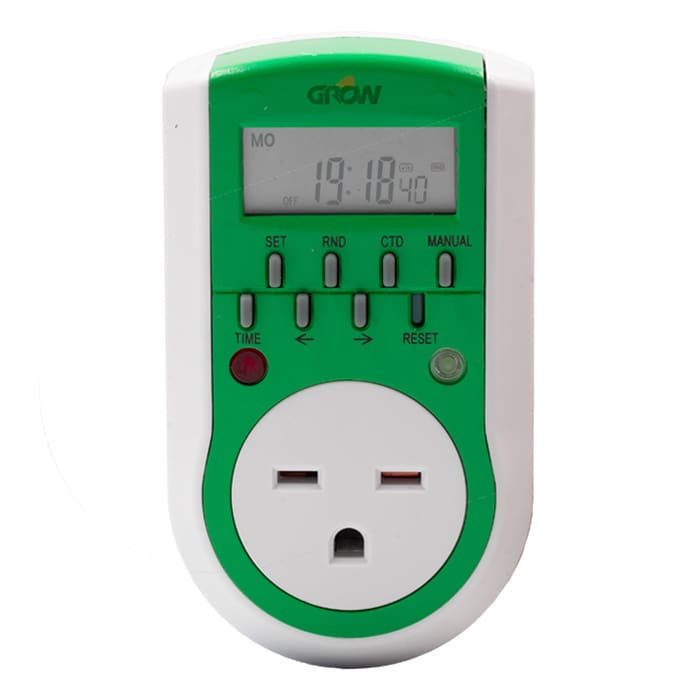 Digital timer switch with green accents.