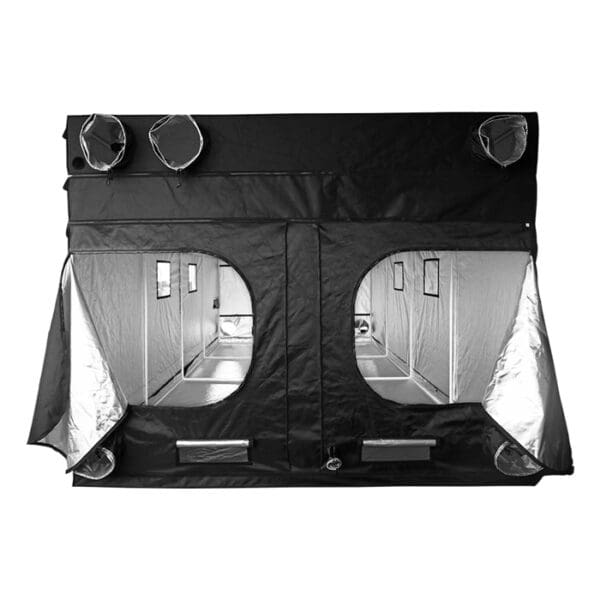 Indoor grow tent with reflective interior design.