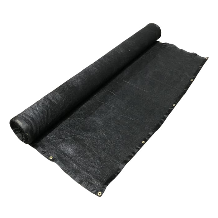 Black tarpaulin rolled out flat.