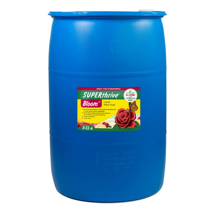 Blue barrel of liquid plant food.