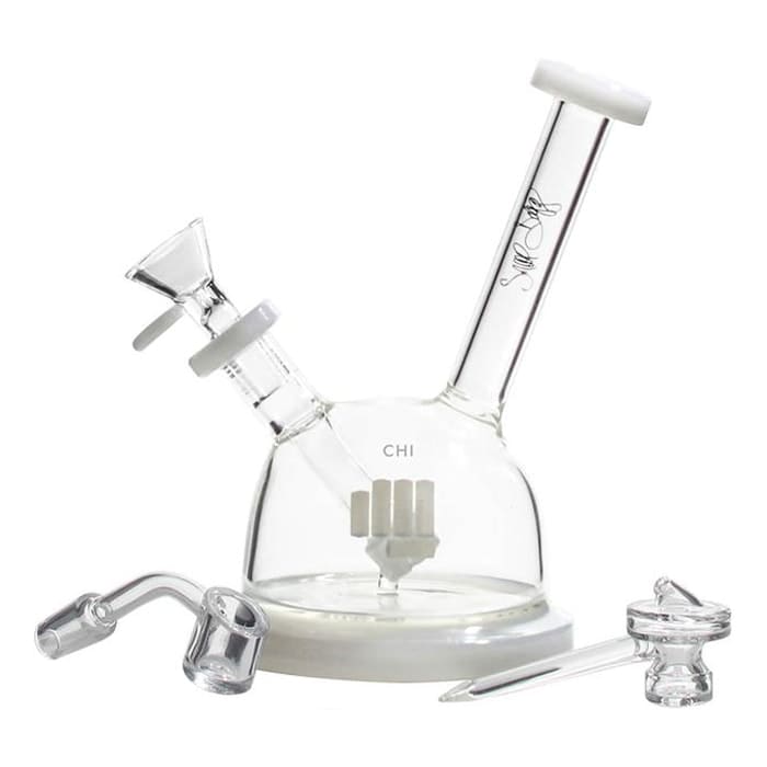 Glass bong with multiple attachments and design.