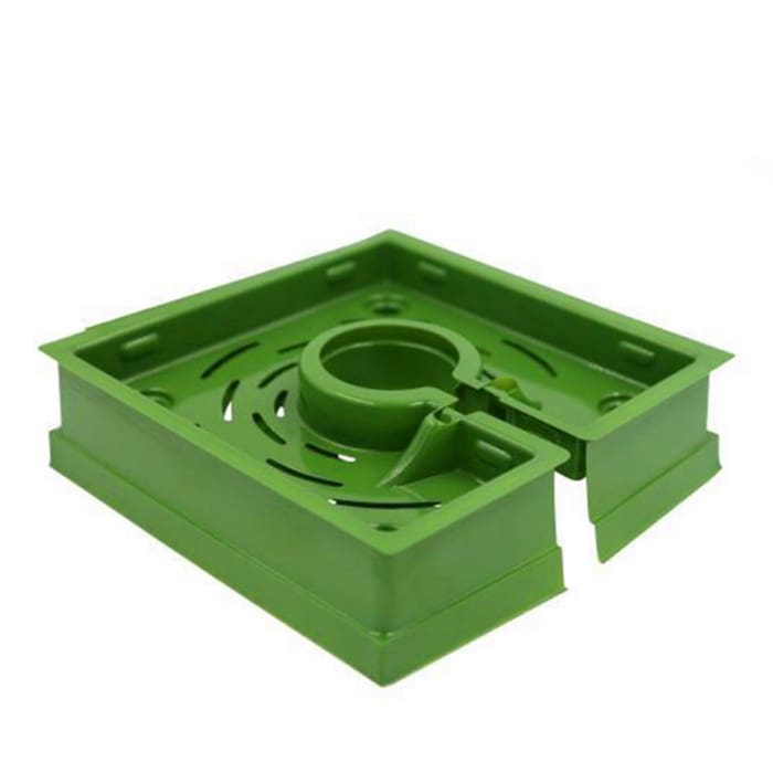 Green plastic tray for holding items.