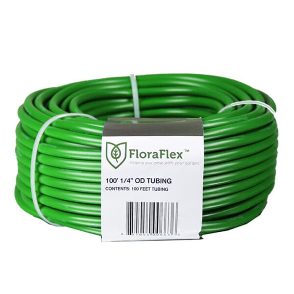 Green gardening tubing roll with label.