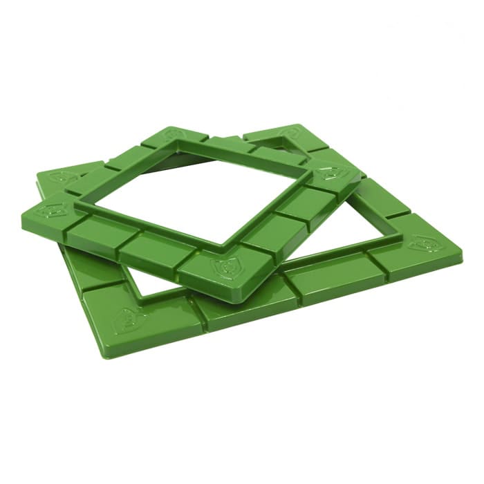 Green plastic square frames stacked together.