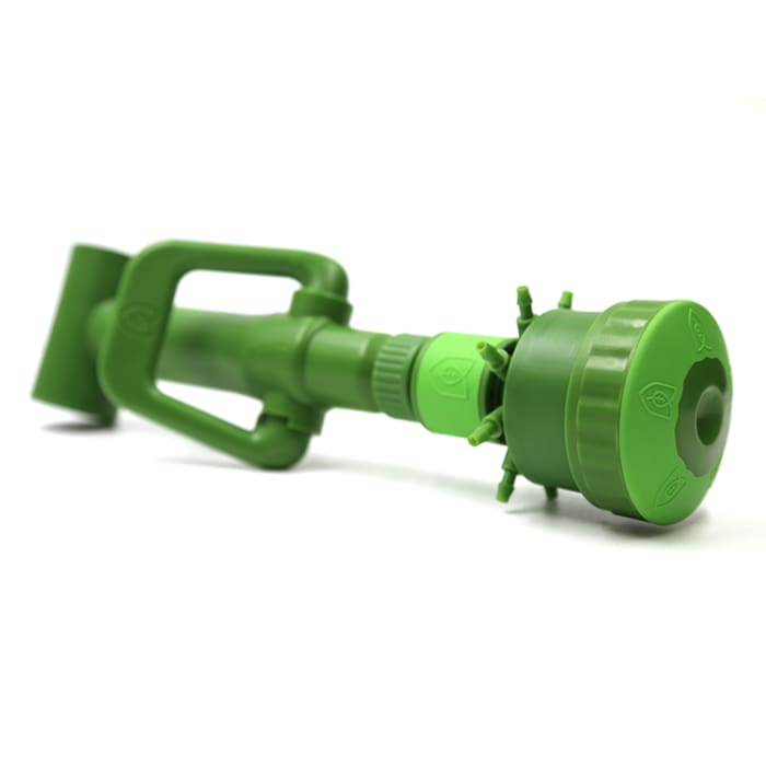 Green plastic garden watering tool.