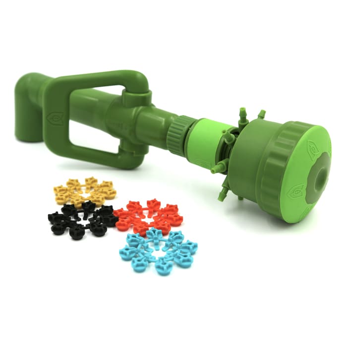 Green toy water gun with colorful attachments.