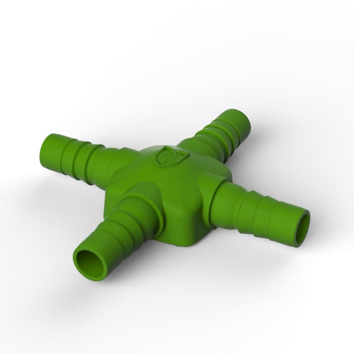 Green plastic connector with multiple hose ends.