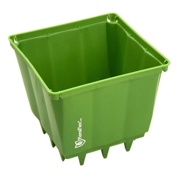 Green square plastic container for planting.