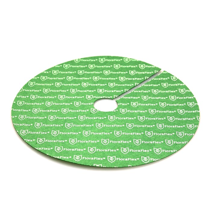 Green circular garden mat with logo pattern.