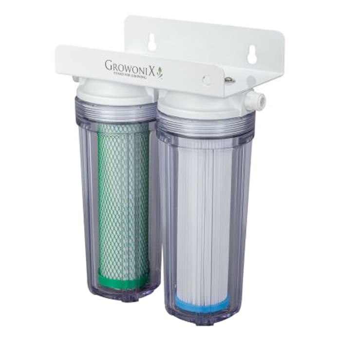 Water filtration system with dual cartridges.