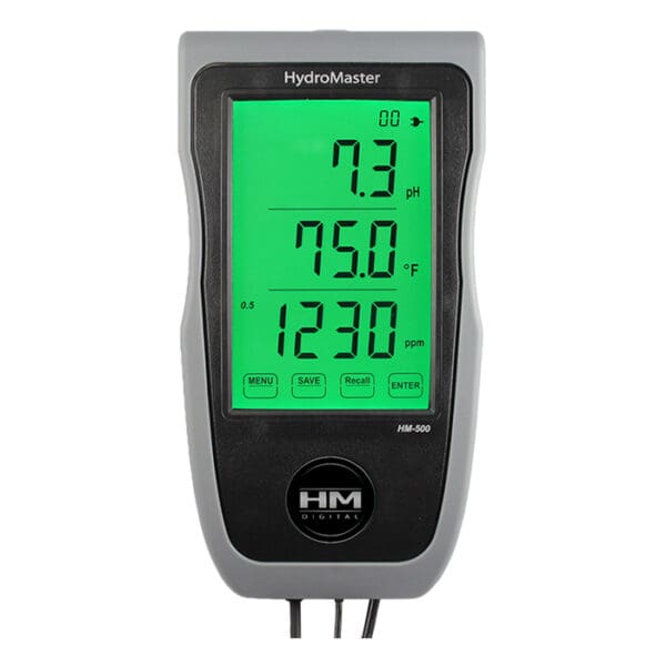 Digital water quality meter displaying readings.