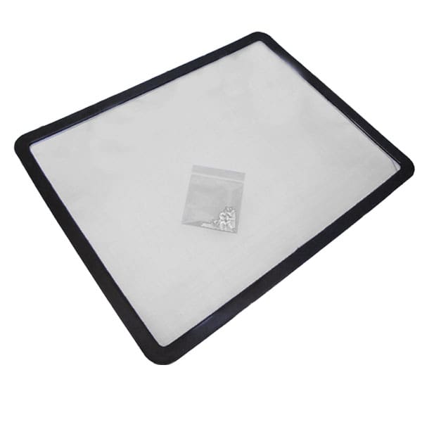 Tray with small plastic bag on surface.