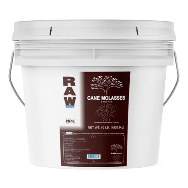 White bucket of cane molasses fertilizer.