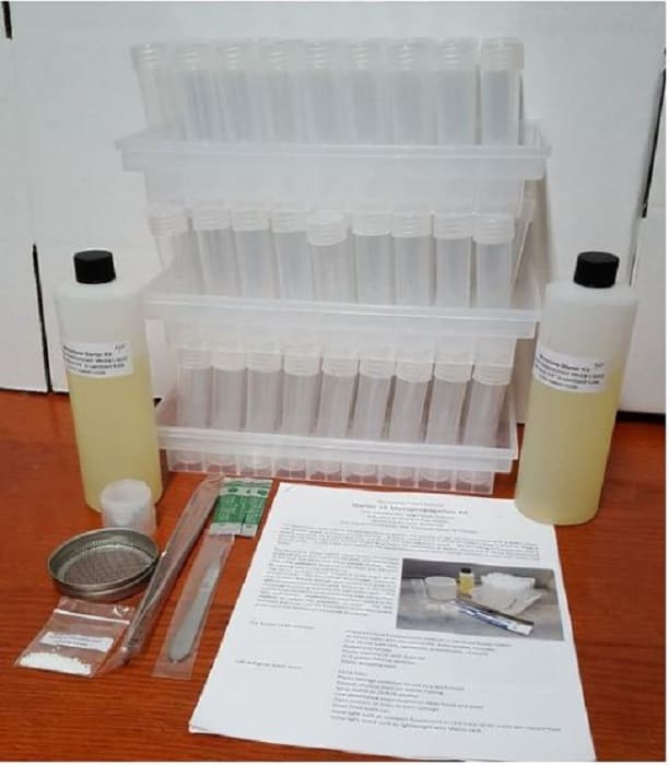 Laboratory equipment and instructions on a table.