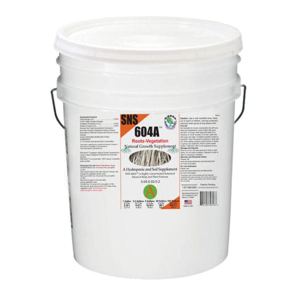 White bucket labeled natural growth supplement.