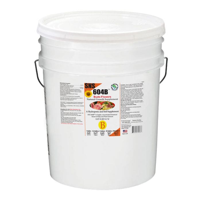 White bucket of natural growth supplement.