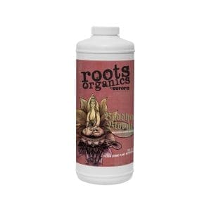 Roots Organics nutrient bottle with floral design.