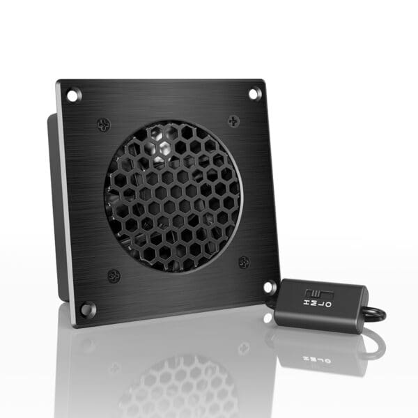 Black speaker with hexagonal grille design.