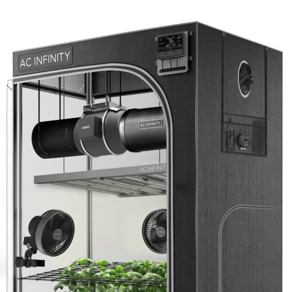 Indoor gardening setup with ventilation system.